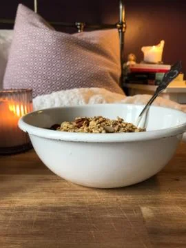 Breakfast in bed with candle in the background Stock Photos