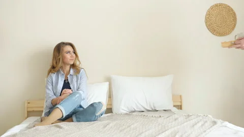 Breakfast in bed couple drinks coffee Stock Footage 105167120