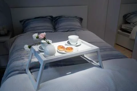 Breakfast in bed. Donuts for breakfast. Breakfast in bed at weekend Stock Photos