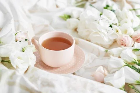 Breakfast in bed in hotel room. Accommodation. Breakfast in bed with tea cup  Stock Photos