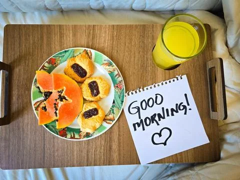 Breakfast in bed with ticket Stock Photos