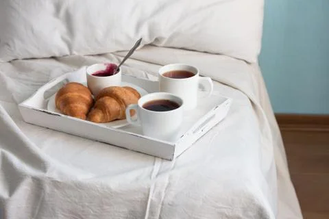 Breakfast in bed. Window light 写真素材