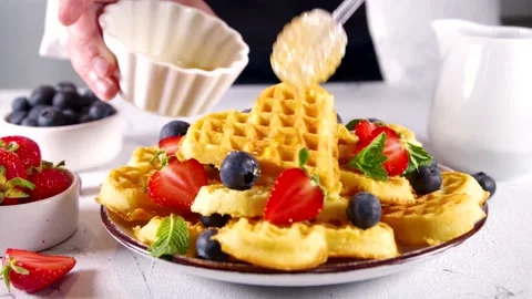 Breakfast belgian waffles with berry Stock Footage 197378582