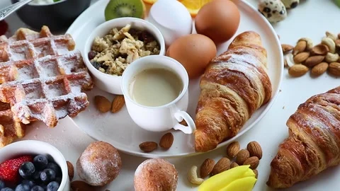 Breakfast with boiled eggs. Top view, rotation Stock Footage 130763610