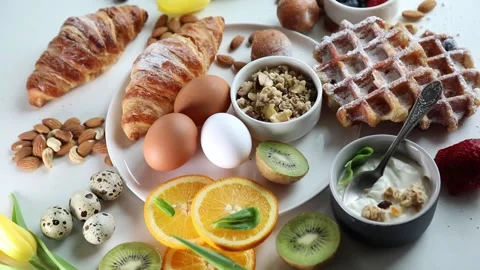 Breakfast with boiled eggs. Top view, rotation Stock Footage 304656577