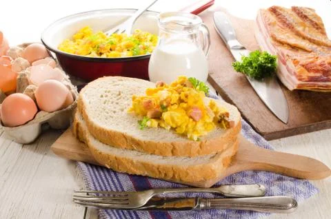 Breakfast with bread and scrambled egg Stock Photos