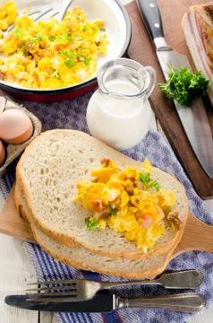 Breakfast with bread and scrambled egg Stock Photos