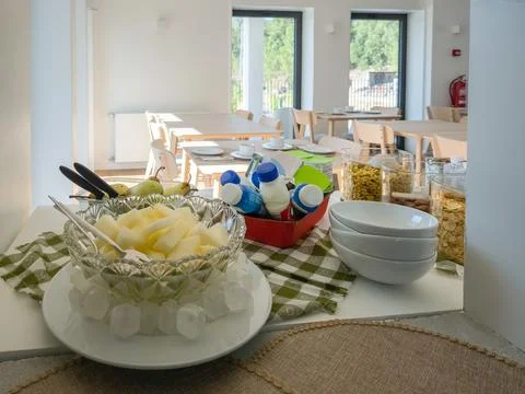 Breakfast Buffet with Fresh Drinks, Dairy, Fruit and Cereals Stock Photos