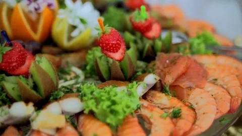 Breakfast buffet, shrimp, and fruit looks beautiful on the plate Stock Footage 69748560
