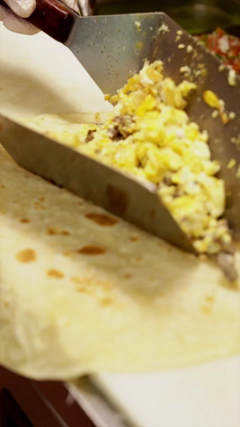 BREAKFAST BURRITO -  4K VERTICAL 60FPS SONY FX3 Video stock 250118858