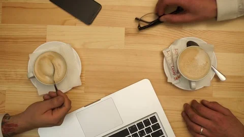 Breakfast in the cafe two business men Stock Footage 70665371