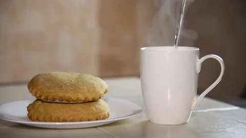 Breakfast with cakes and tea. Stock Footage 145094472