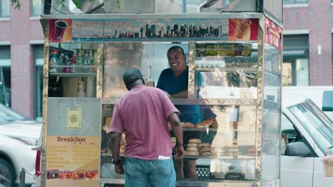 A Breakfast Cart Chats With A Customer Stock Footage 248236876