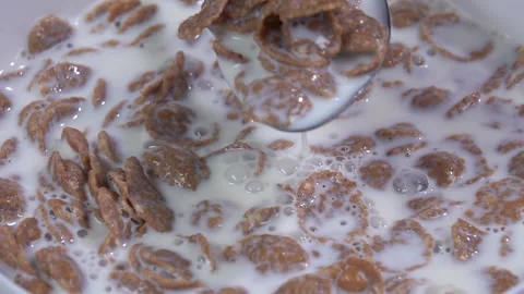 Breakfast cereal with milk. Slow motion 250 fps 動画素材 132669586