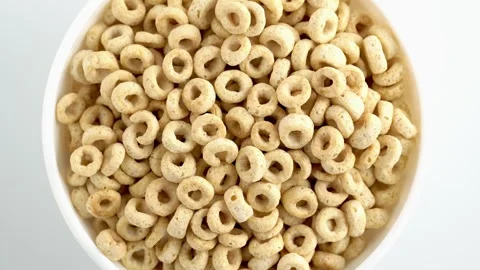 Breakfast cereal rings rotation close up top view. Rotation organic flakes,.. Stock Footage 247894455