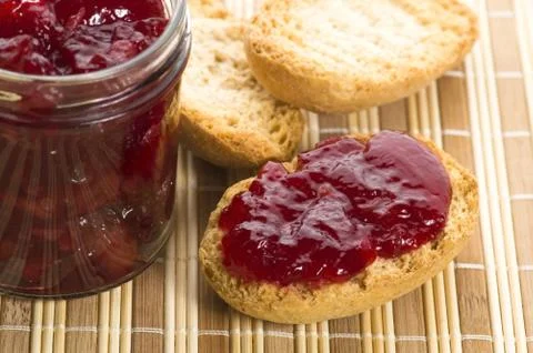 Breakfast of cherry jam on toast Stock Photos