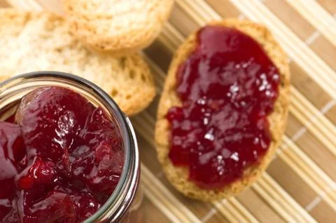 Breakfast of cherry jam on toast Stock Photos