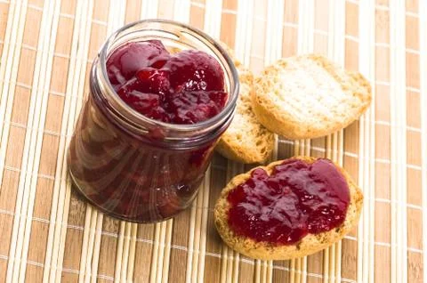 Breakfast of cherry jam on toast Stock Photos