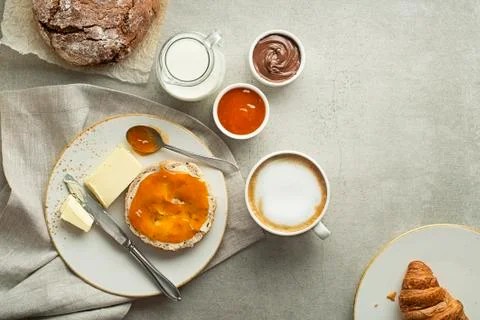 Breakfast with coffee, bread, jam and butter Stock Photos