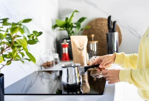 Breakfast coffee concept. Process of making coffee at home. Stock Photos