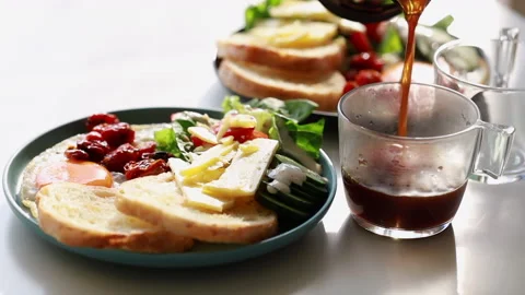 Breakfast with Coffee Pouring Stock Footage 160139936