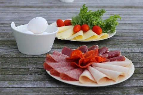 Breakfast with cold cuts and eggs Stock Photos