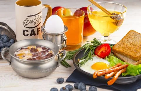 Breakfast composition in the kitchen Stock Photos