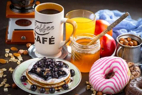 Breakfast composition in the kitchen Stock Photos