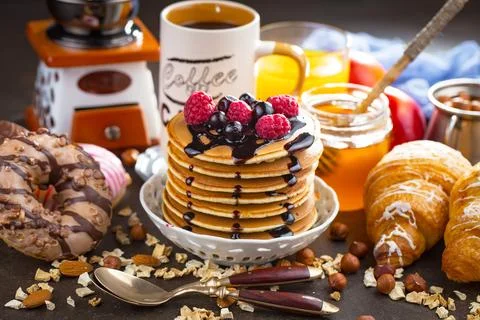 Breakfast composition in the kitchen Stock Photos