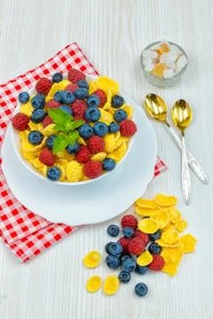 Breakfast of cornflakes and berries Stock Photos