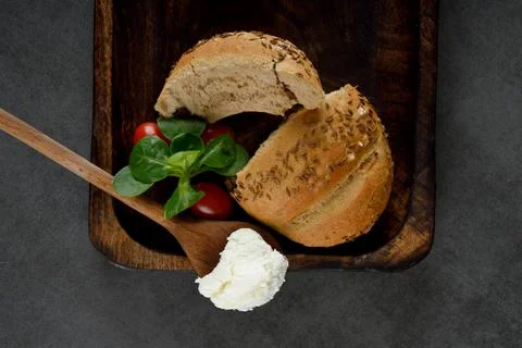 Breakfast. Cream Cheese, Tomatoes and Grain Bagel Stock Photos