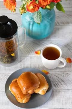 Breakfast with delicious tea rolls Stock Photos
