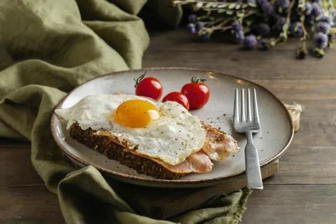Breakfast with egg bacon tomatoes high angle Stock Photos