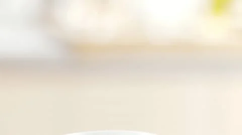 A breakfast egg being cut with a knife and salted Stock Footage 24635837