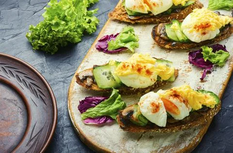 Breakfast with egg benedict Stock Photos