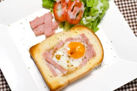Breakfast egg in a hole Stock Photos