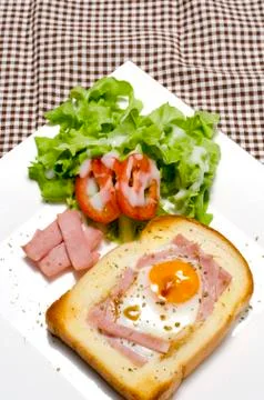Breakfast egg in a hole Stock Photos