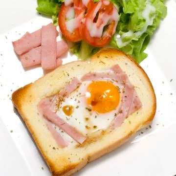 Breakfast egg in a hole Stock Photos