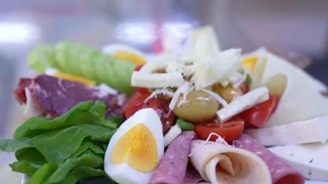 Breakfast, egg, olive, tomato, cheese. Slow motion. close up. Stock Footage 172326115