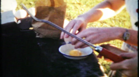 Breakfast with eggs, bacon, potatoes and bread 1950s vintage film home movie 688 Video stock 32786945