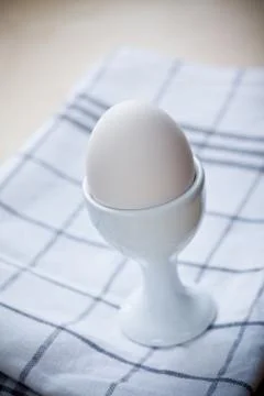 Breakfast eggs in egg cup Foto stock