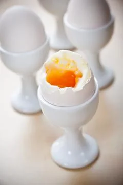 Breakfast eggs in egg cup Foto stock