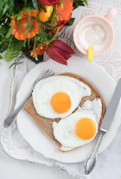 Breakfast with flowers Stock Photos
