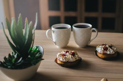 Breakfast, fragrant coffee with biscuits Stock Photos