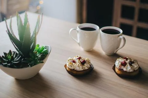Breakfast, fragrant coffee with biscuits Stock Photos