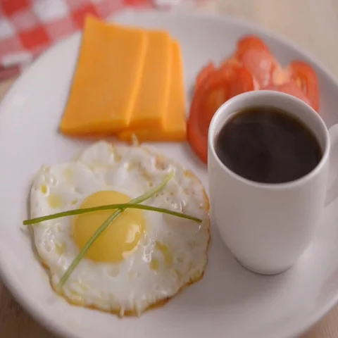 Breakfast with fried egg and black coffee Stock Footage 69512714