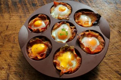 Breakfast - fried egg with bacon Stock Photos