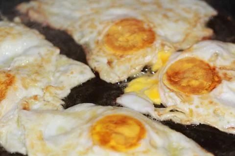 Breakfast fried egg in pan Stock Photos