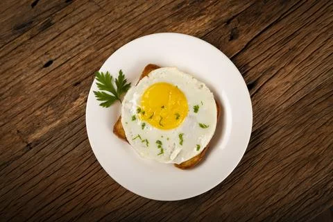 Breakfast with fried egg toast. Stock Photos