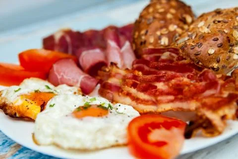 Breakfast with fried eggs and bacon Stock Photos